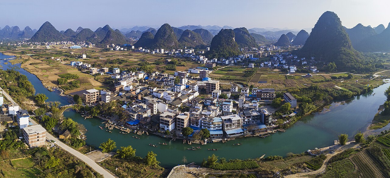 Aerial panorama of Yangshuo karst mountains and Yulong River valley