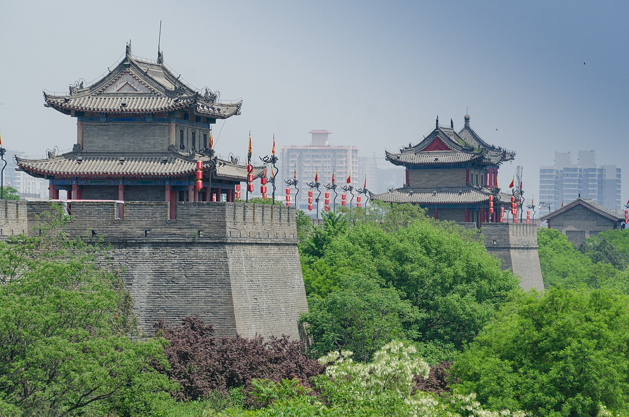 Ancient Ming Dynasty Xi’an City Wall fortifications and watchtower at dusk