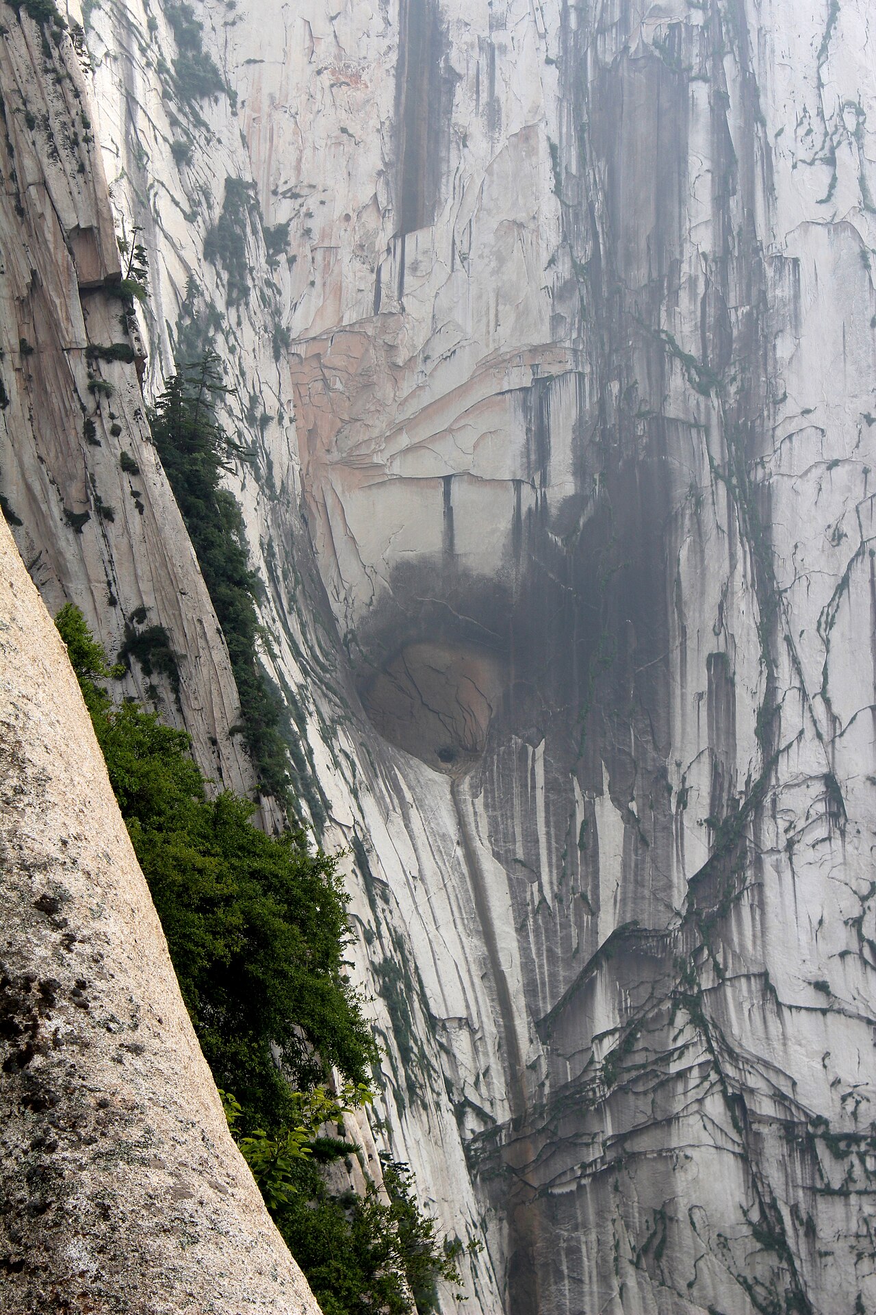 Sheer granite cliffs and dramatic mountain peaks of Mount Huashan near Xi’an