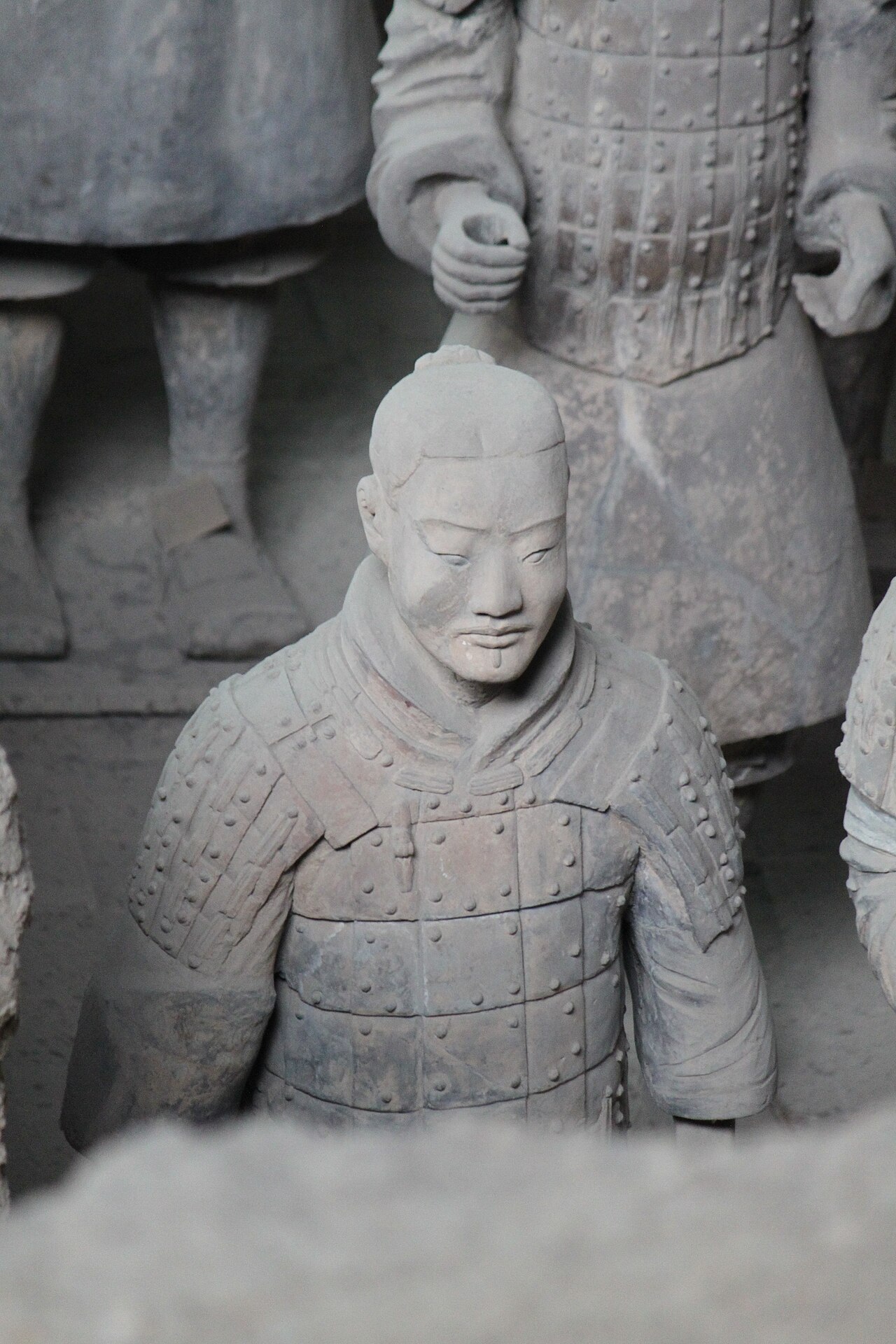 Rows of life-sized Qin Dynasty Terracotta Warriors standing in battle formation inside Pit 1 in Xi’an