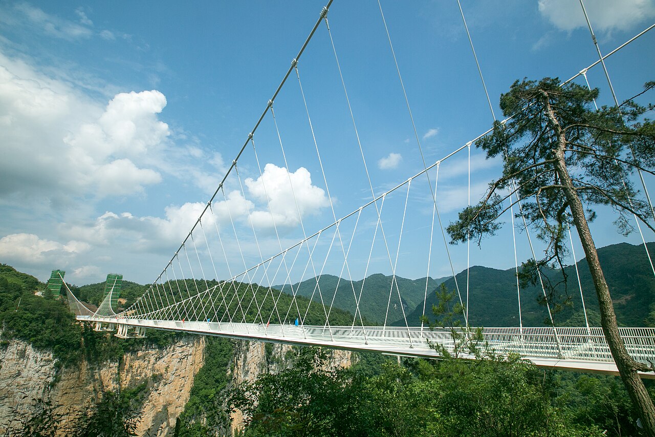 Zhangjiajie Grand Canyon Glass Bridge spanning two sandstone cliffs